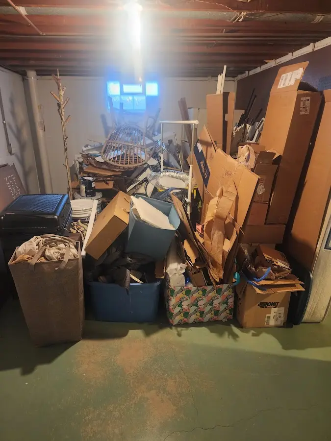 Roll-off dumpster container at job site for 20 Yard Dumpster Rental in Bartlett